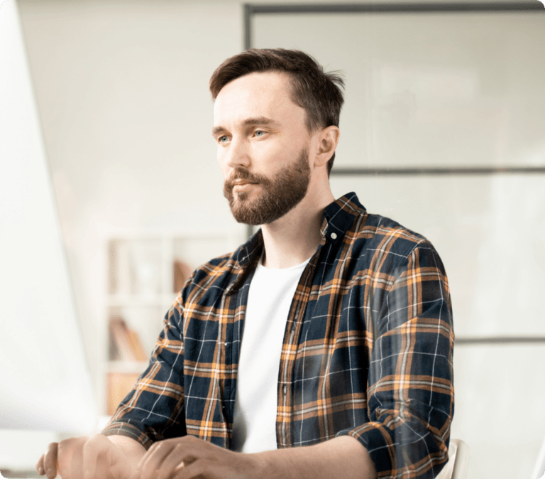 Field service employee on computer.